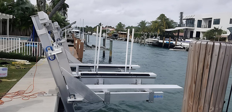 Deco double jet ski lift aluminum frame installation — South Florida canal